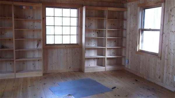 224 Red Gable Road East Brookfield, MA 01515 - Photo 7 of 21 a room with a window and wooden floor