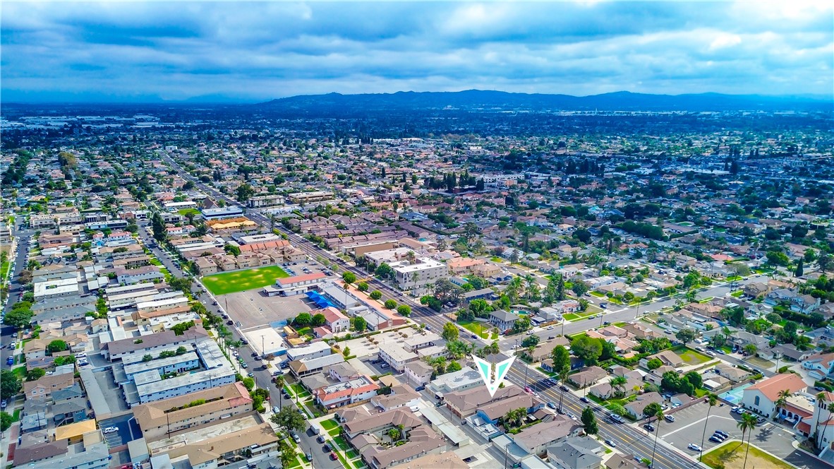 10515 Downey Avenue Downey, CA 90241 - Photo 5 of 6 an aerial view of residential houses with outdoor space