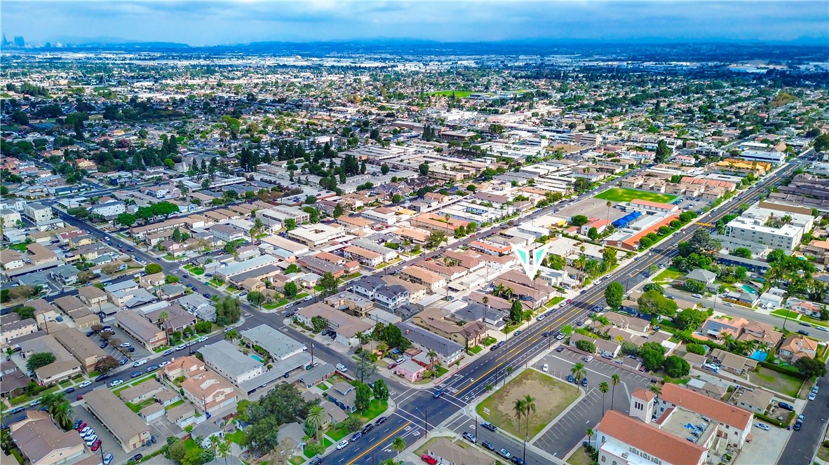 10515 Downey Avenue Downey, CA 90241 - Photo 6 of 6 an aerial view of a city with lots of residential buildings