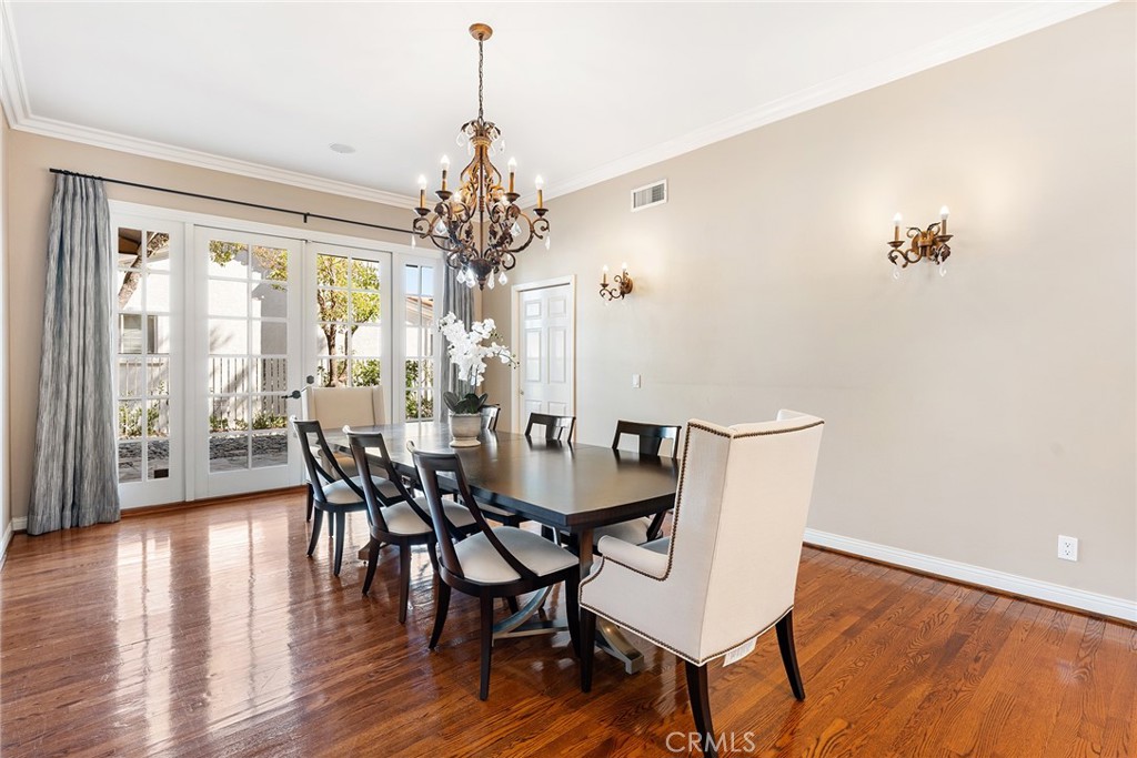 24920 Paseo Del Rancho Calabasas, CA 91302 - Photo 19 of 61 a view of a dining room with furniture window and wooden floor