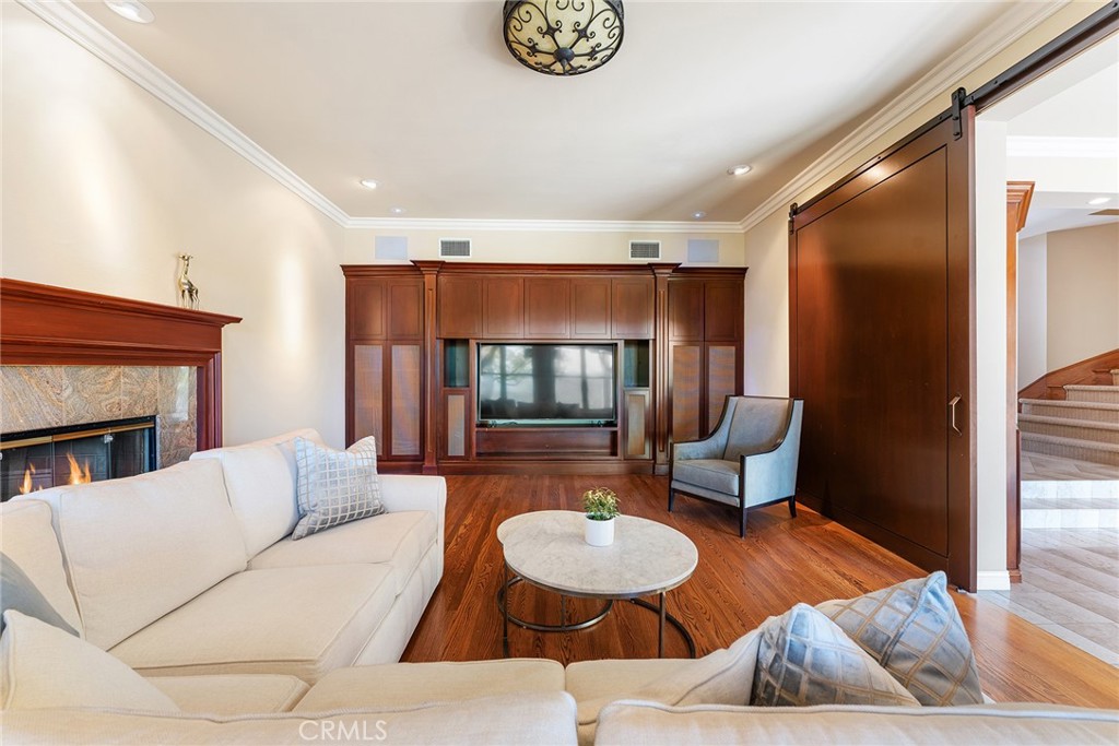 24920 Paseo Del Rancho Calabasas, CA 91302 - Photo 28 of 61 a living room with furniture and a fireplace