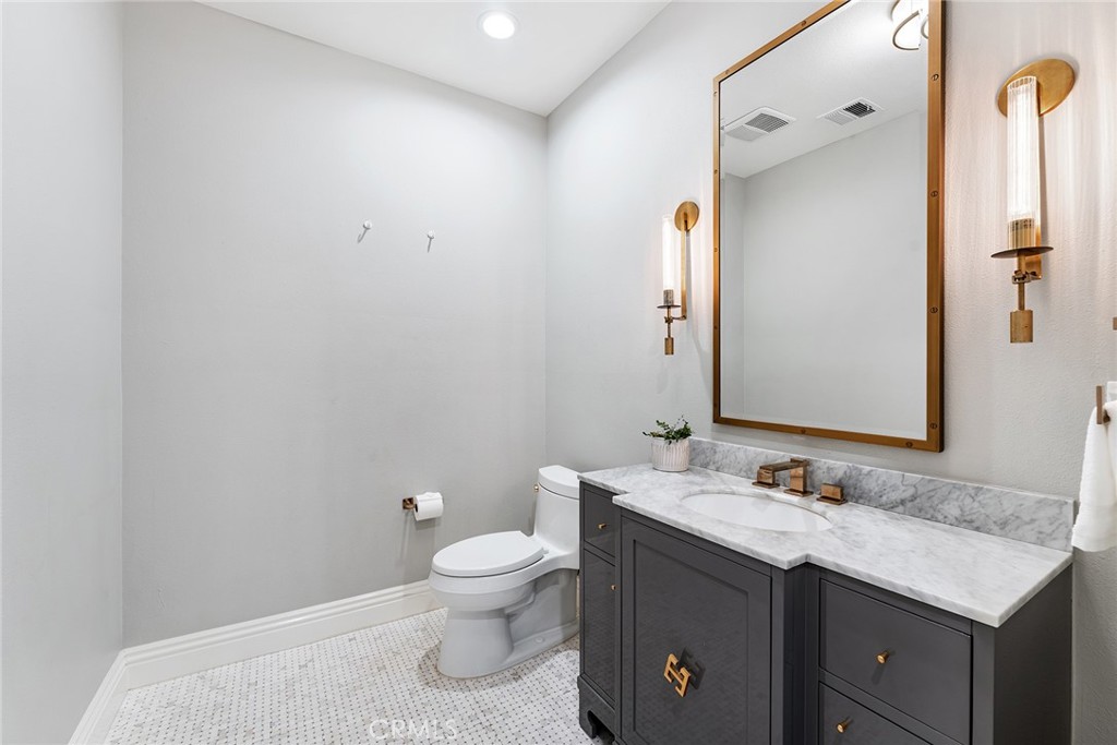 24920 Paseo Del Rancho Calabasas, CA 91302 - Photo 30 of 61 a bathroom with a granite countertop sink toilet and shower