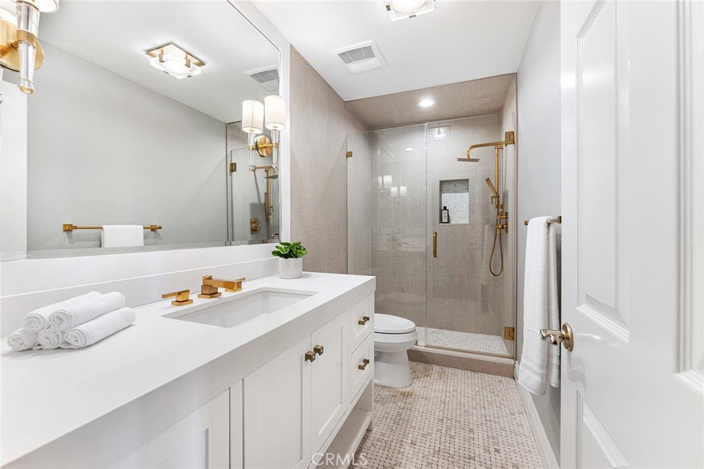 24920 Paseo Del Rancho Calabasas, CA 91302 - Photo 33 of 61 a bathroom with a sink a toilet and shower