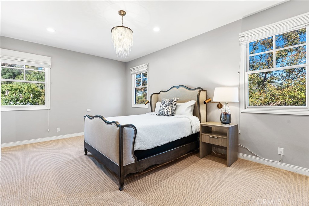 24920 Paseo Del Rancho Calabasas, CA 91302 - Photo 36 of 61 a bed room with a bed and a window