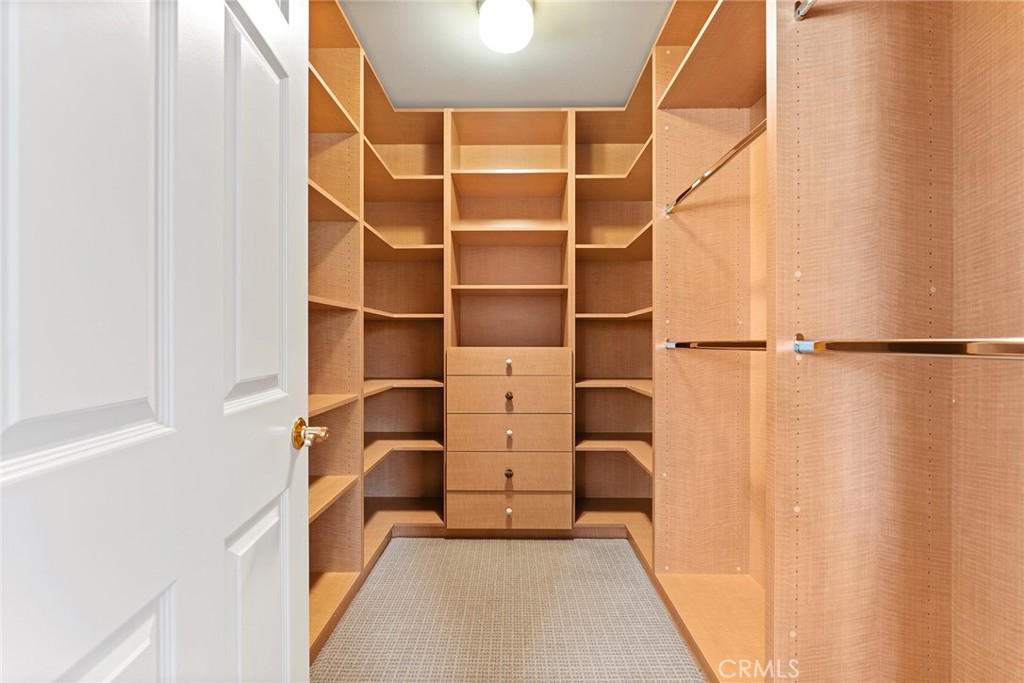 24920 Paseo Del Rancho Calabasas, CA 91302 - Photo 37 of 61 a view of walk in closet with empty racks