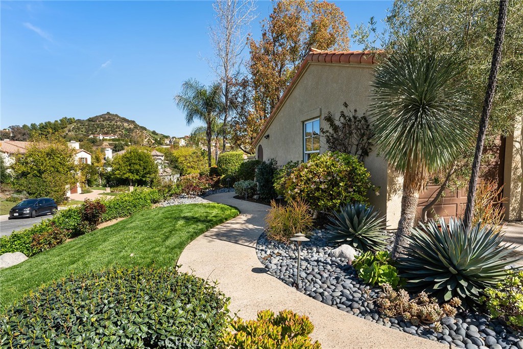 24920 Paseo Del Rancho Calabasas, CA 91302 - Photo 4 of 61 a view of a house with a garden