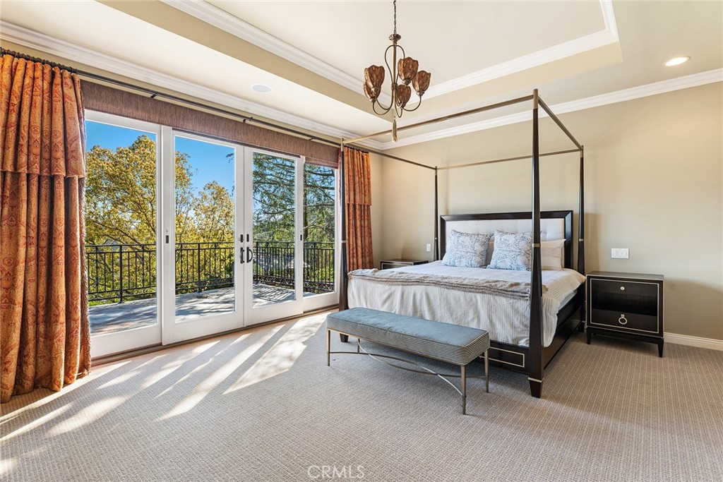 24920 Paseo Del Rancho Calabasas, CA 91302 - Photo 40 of 61 a bed sitting in a spacious bedroom next to a window