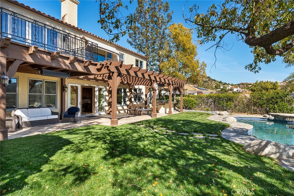 24920 Paseo Del Rancho Calabasas, CA 91302 - Photo 51 of 61 a view of a house with backyard porch and sitting area