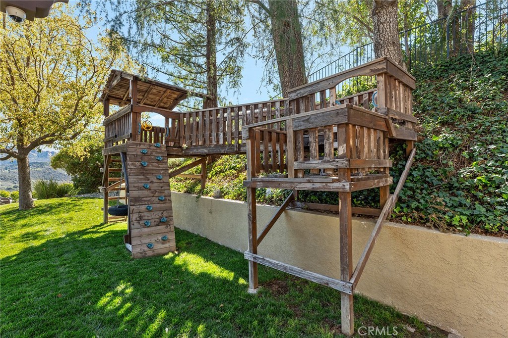 24920 Paseo Del Rancho Calabasas, CA 91302 - Photo 53 of 61 a view of a house with backyard and trees