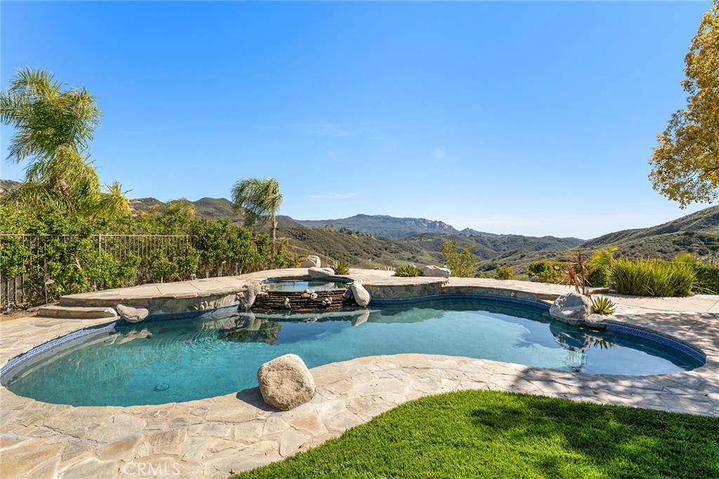24920 Paseo Del Rancho Calabasas, CA 91302 - Photo 54 of 61 a view of a swimming pool and lake view