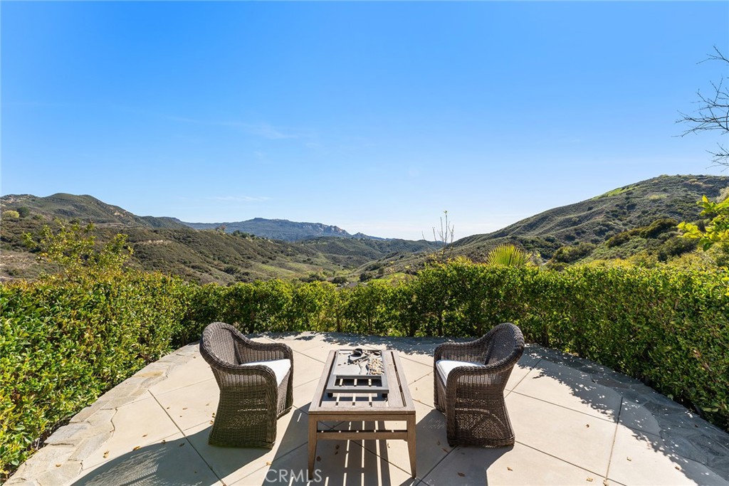 24920 Paseo Del Rancho Calabasas, CA 91302 - Photo 57 of 61 a view of a chairs and table in patio