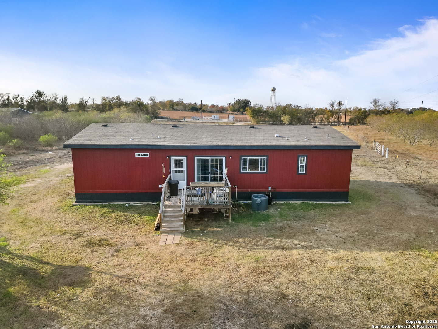3809 Callihan Road Luling, TX 78648 - Photo 30 of 38 a view of a yard with swimming pool and lake view