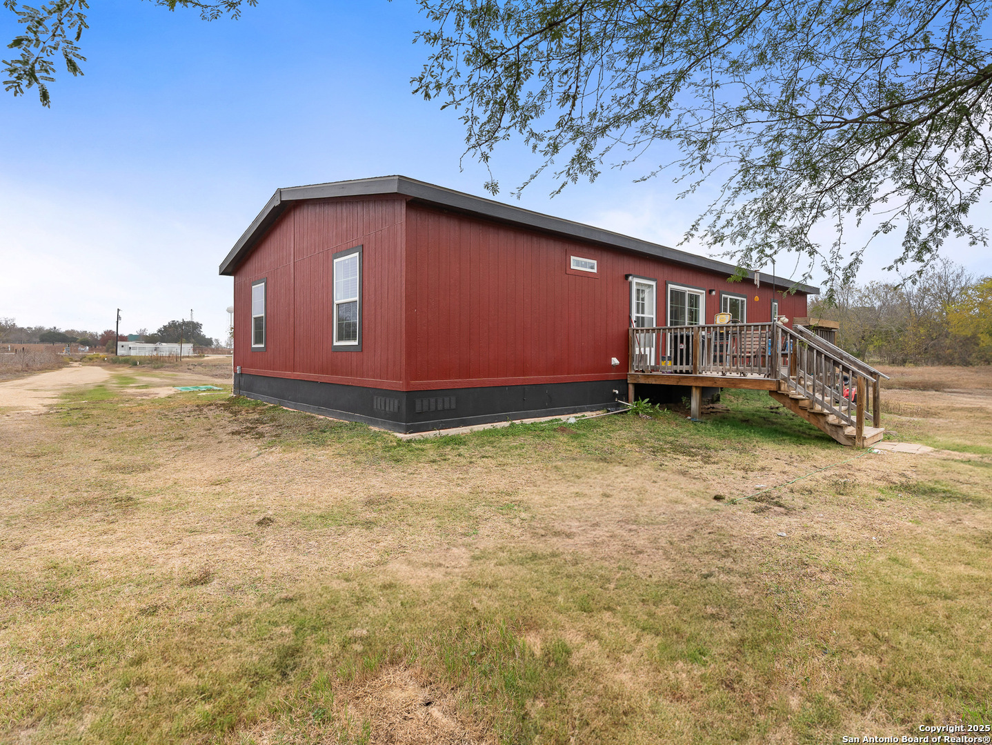 3809 Callihan Road Luling, TX 78648 - Photo 31 of 38 a front view of a house with a yard