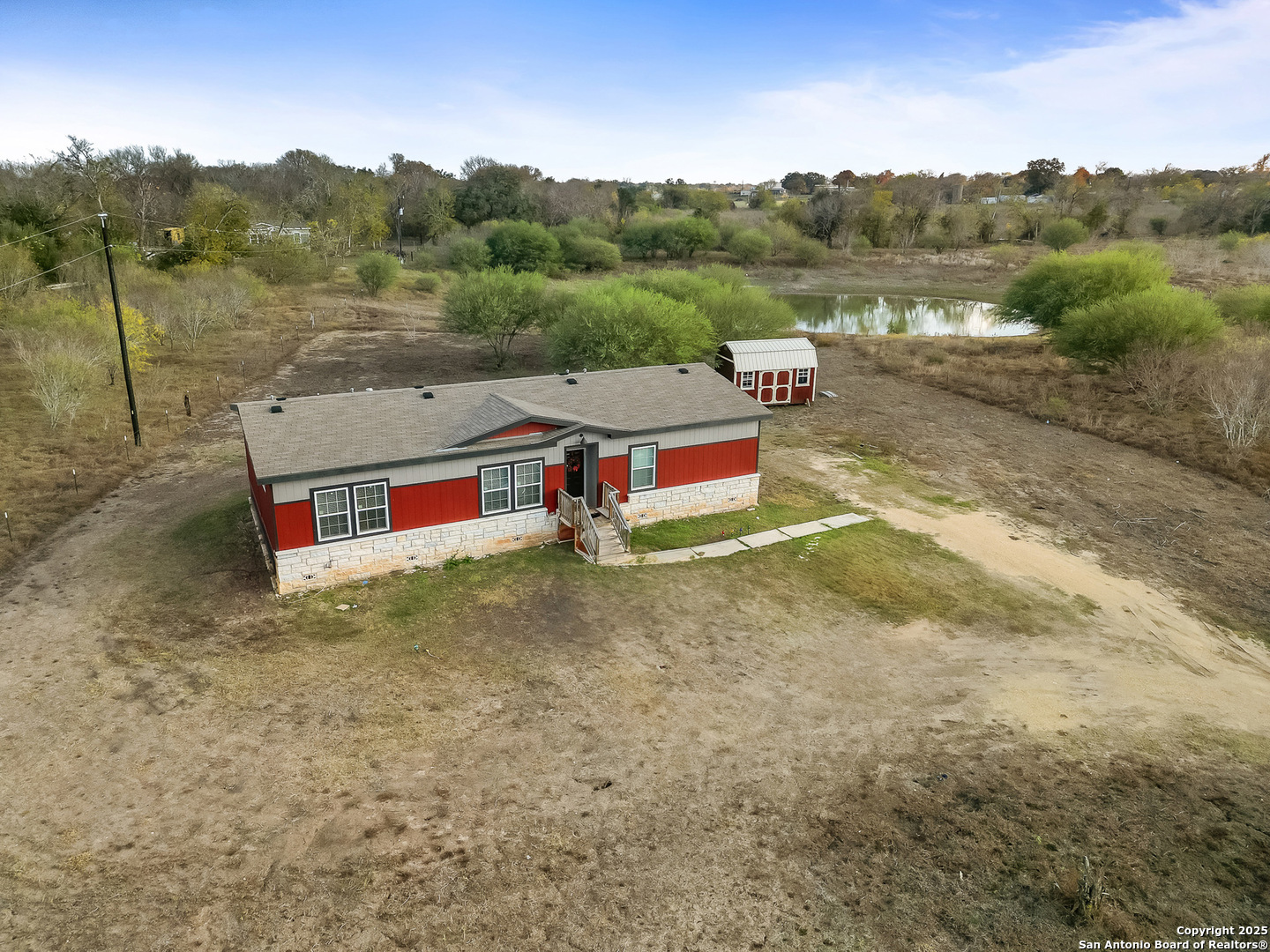 3809 Callihan Road Luling, TX 78648 - Photo 4 of 38 a view of a big yard with table and chairs