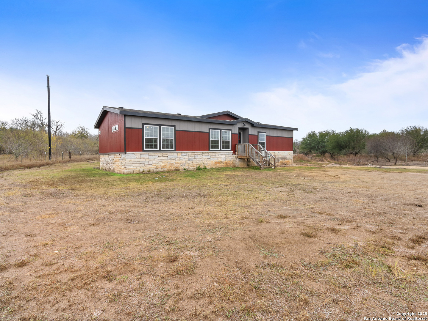 3809 Callihan Road Luling, TX 78648 - Photo 5 of 38 a view of a house with a yard