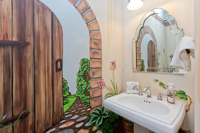 a bathroom with a sink and a mirror