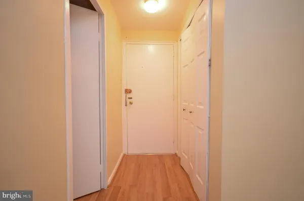 a view of a bathroom from a hallway