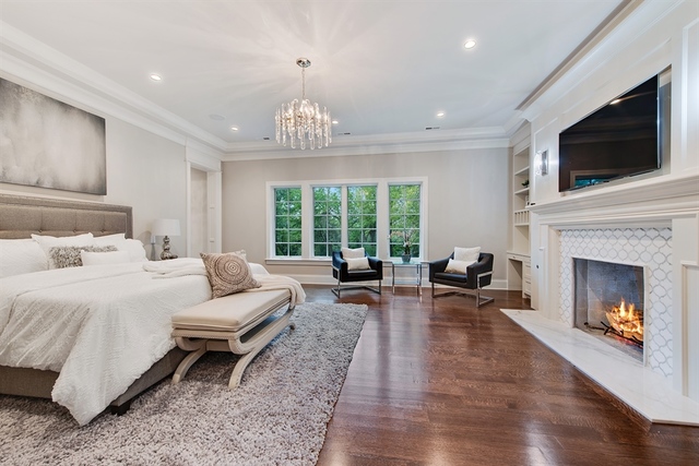 Undisclosed Address Glencoe, IL 60022 - Photo 15 of 30 a living room with furniture fireplace and flat screen tv