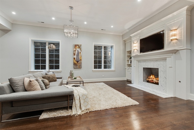 Undisclosed Address Glencoe, IL 60022 - Photo 26 of 30 a living room with furniture fireplace and flat screen tv