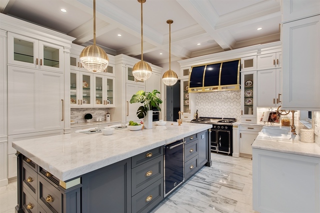 Undisclosed Address Glencoe, IL 60022 - Photo 7 of 30 a kitchen with a stove kitchen island and couches