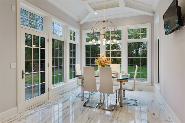 Undisclosed Address Glencoe, IL 60022 - Photo 9 of 30 a view of a dining room with furniture window and outside view