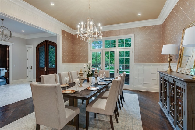 Undisclosed Address Glencoe, IL 60022 - Photo 10 of 30 a view of a dining room with furniture a chandelier and wooden floor
