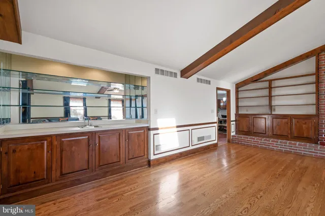 a view of a hallway with staircase