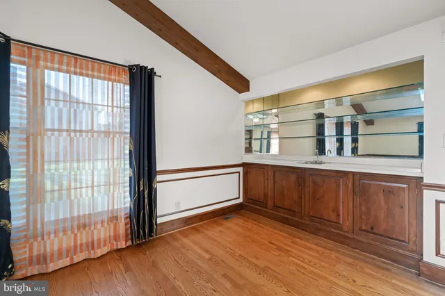 a bathroom with a bathtub and sink