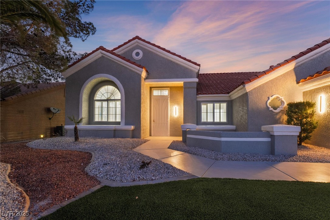 2528 Sunup Drive Las Vegas, NV 89134 - Photo 5 of 24 Mediterranean / spanish house featuring stucco siding and a tiled roof