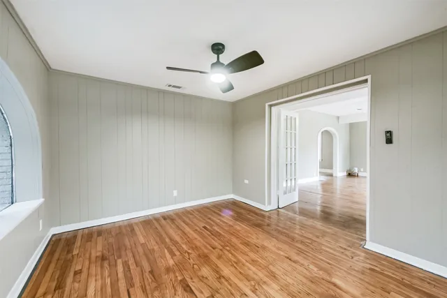a kitchen with a sink cabinets and refrigerator