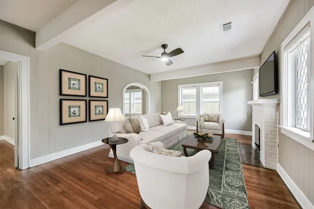 a view of an empty room with a large window