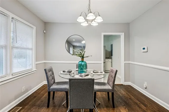 a kitchen with stainless steel appliances granite countertop a stove a sink dishwasher a refrigerator and a microwave