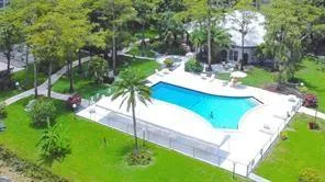 a view of a lake in front of house with a yard