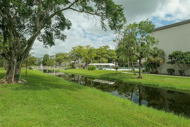 a view of swimming pool with a patio