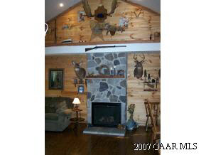 589 Curry Road Churchville, VA 24421 - Photo 7 of 12 a living room with a fireplace