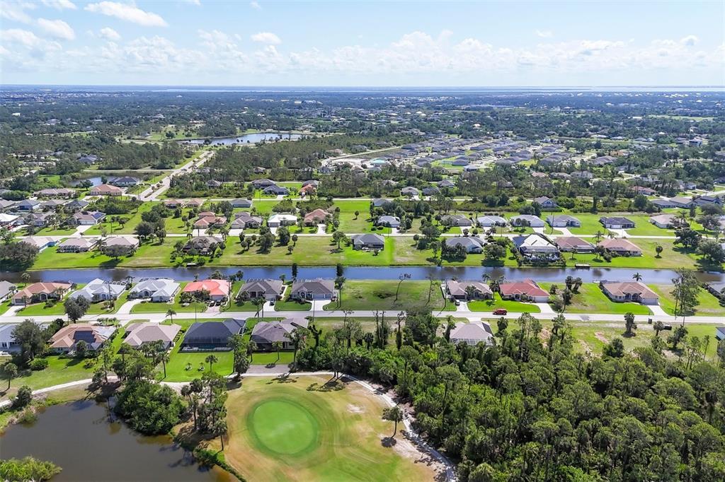 760 Rotonda Circle Rotonda West, FL 33947 - Photo 12 of 30 an aerial view of a houses with a swimming pool