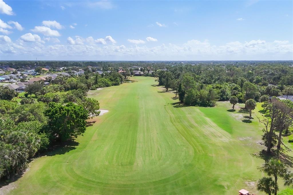 760 Rotonda Circle Rotonda West, FL 33947 - Photo 14 of 30 a view of lake with green space