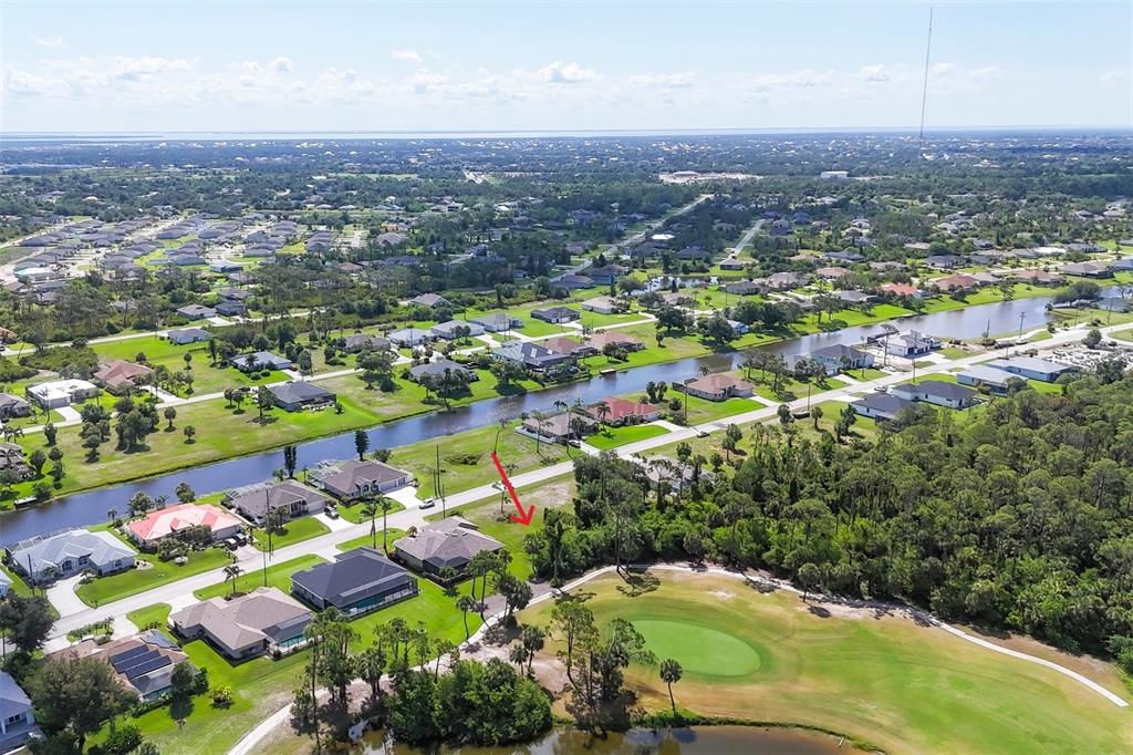 760 Rotonda Circle Rotonda West, FL 33947 - Photo 19 of 30 an aerial view of residential houses with outdoor space