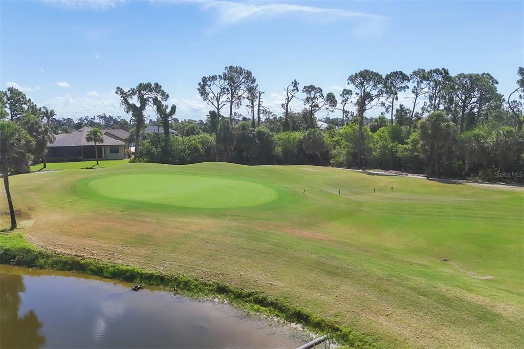 760 Rotonda Circle Rotonda West, FL 33947 - Photo 20 of 30 a view of a field with a yard