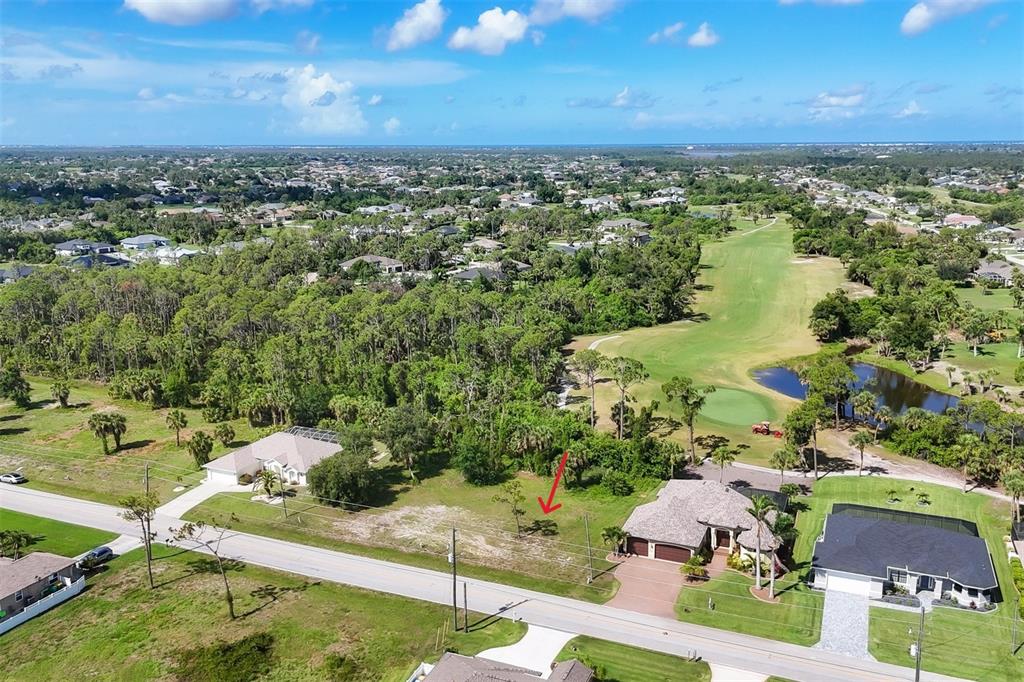 760 Rotonda Circle Rotonda West, FL 33947 - Photo 4 of 30 an aerial view of residential houses with outdoor space and trees