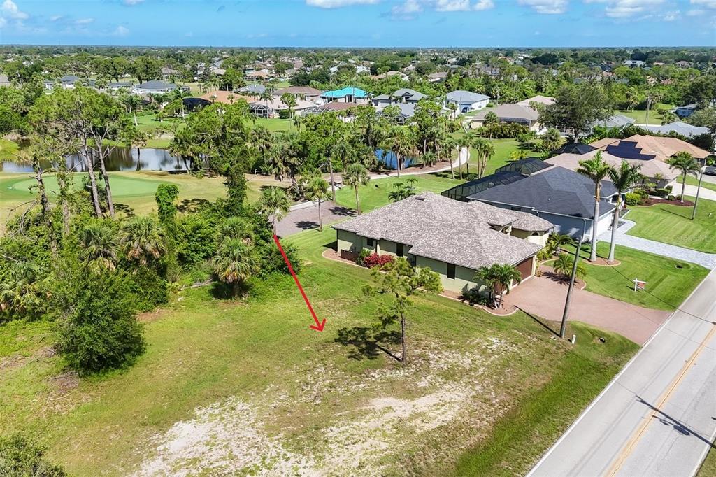 760 Rotonda Circle Rotonda West, FL 33947 - Photo 6 of 30 a view of a house with a yard