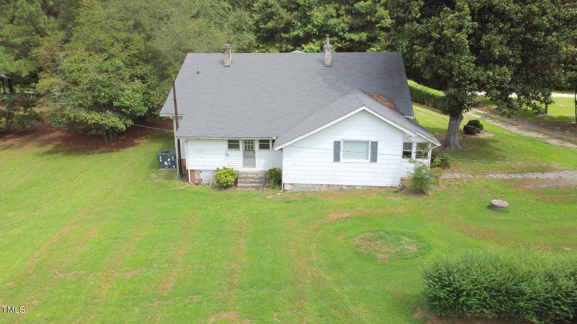 131 King Road Warrenton, NC 27589 - Photo 12 of 67 a aerial view of a house with swimming pool and garden