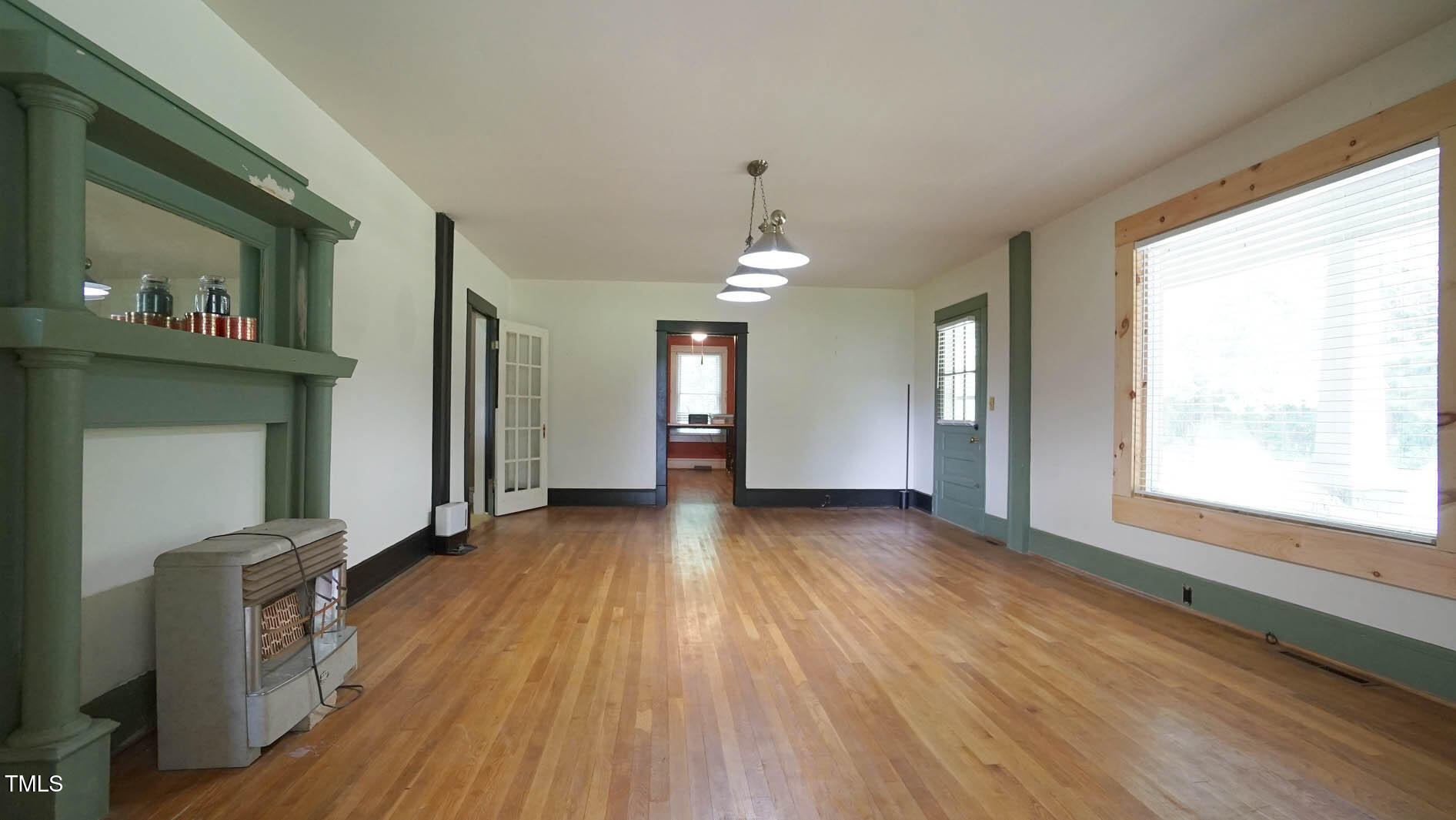 131 King Road Warrenton, NC 27589 - Photo 17 of 67 a view of a room with wooden floor and a window