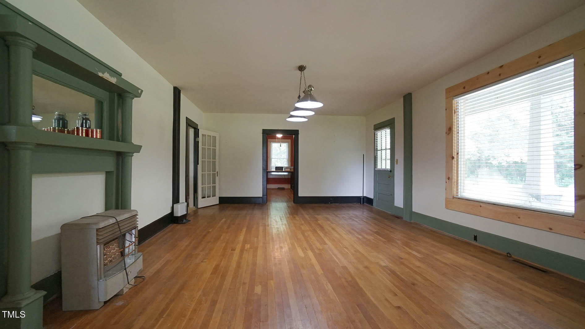 131 King Road Warrenton, NC 27589 - Photo 18 of 67 a view of a room with wooden floor and a window