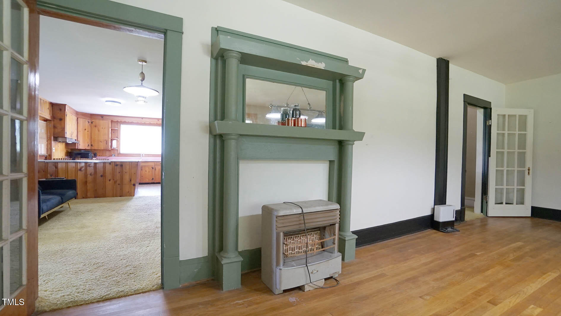 131 King Road Warrenton, NC 27589 - Photo 19 of 67 a view of a livingroom with furniture and a fireplace
