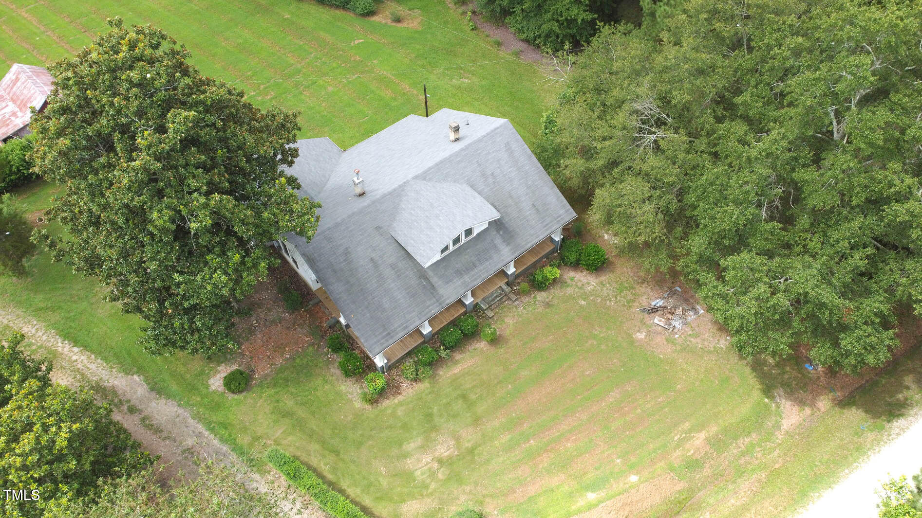 131 King Road Warrenton, NC 27589 - Photo 2 of 67 an aerial view of a house with a yard and trees all around