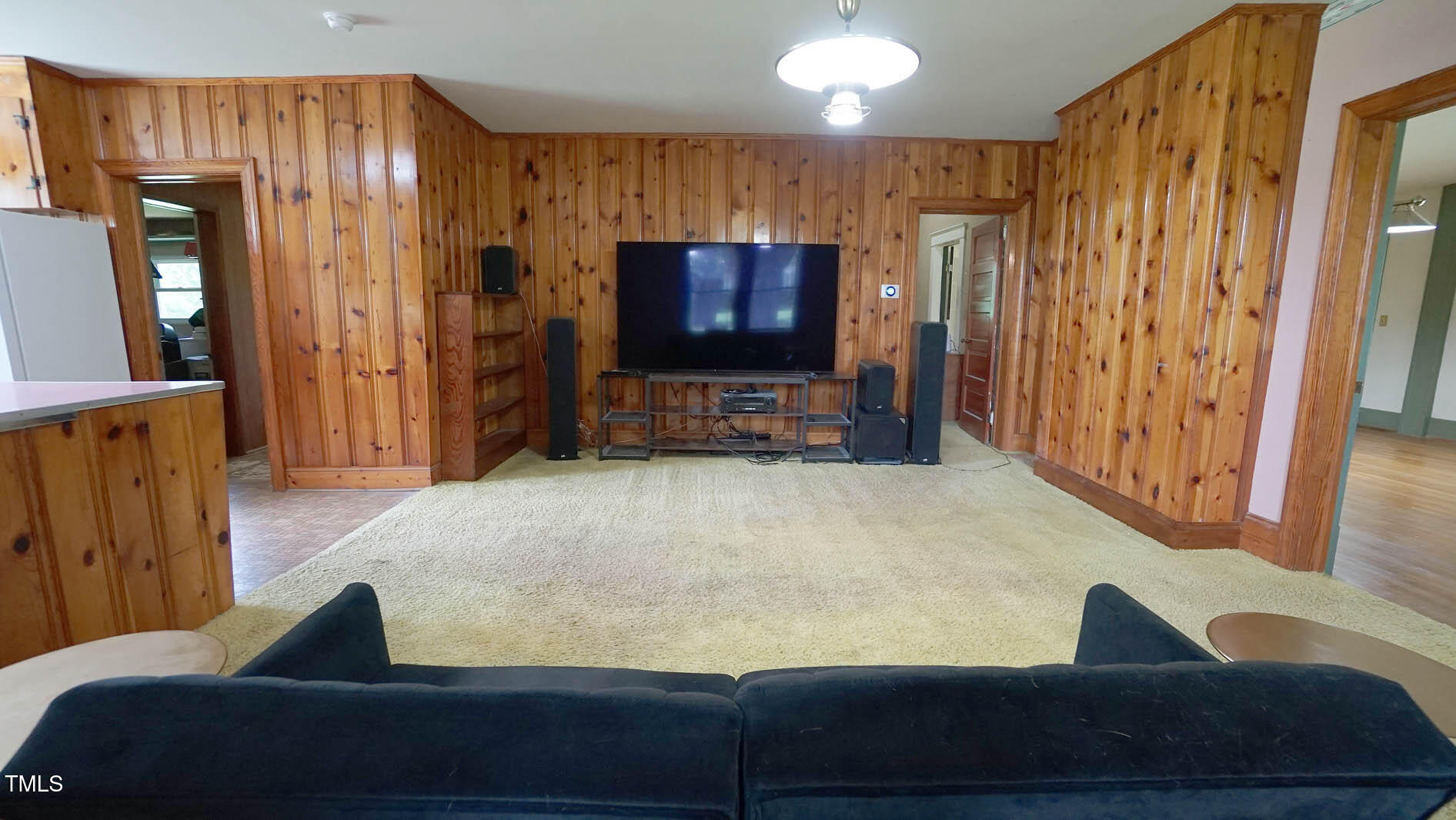 131 King Road Warrenton, NC 27589 - Photo 31 of 67 a living room with furniture and a flat screen tv