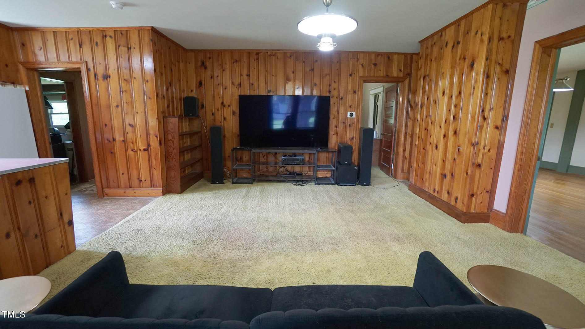 131 King Road Warrenton, NC 27589 - Photo 32 of 67 a living room with furniture and a flat screen tv