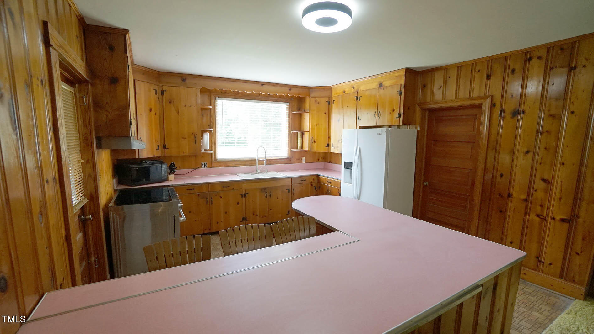 131 King Road Warrenton, NC 27589 - Photo 39 of 67 a kitchen with stainless steel appliances a refrigerator and a window