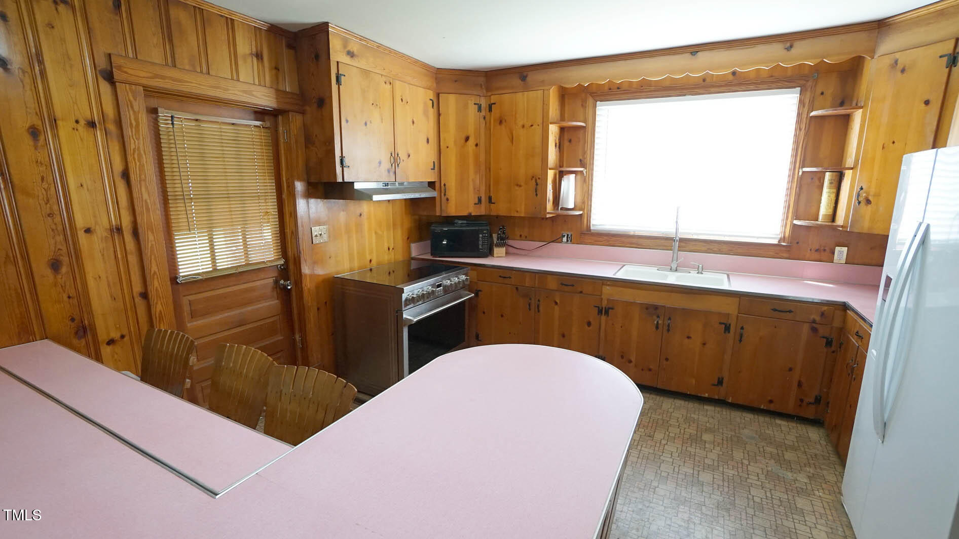 131 King Road Warrenton, NC 27589 - Photo 41 of 67 a kitchen with stainless steel appliances granite countertop a sink a stove and a refrigerator